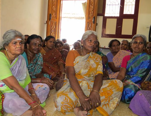 Older women gathered together in a local community space